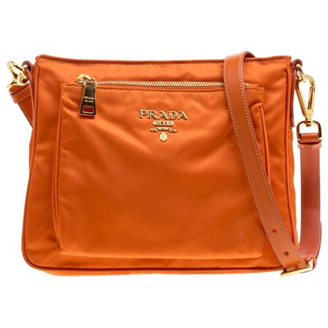 prada clutch padded nylon large orange|prada nylon shoulder bag black.